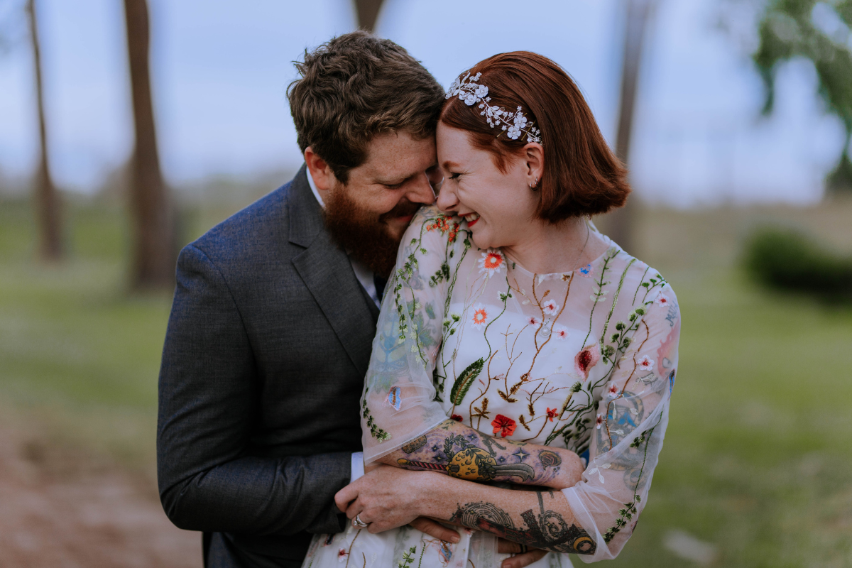 Everlasting Elopements couple smiling and hugging after ceremony