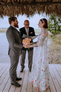 Everlasting Elopements couple during ceremony with Minister Richard Nash