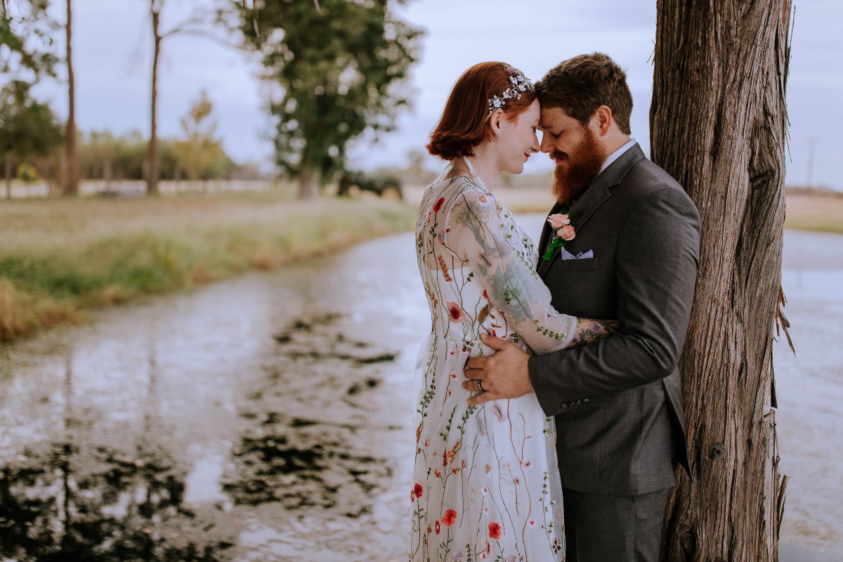 Everlasting Elopements couple touching foreheads after their wedding ceremony